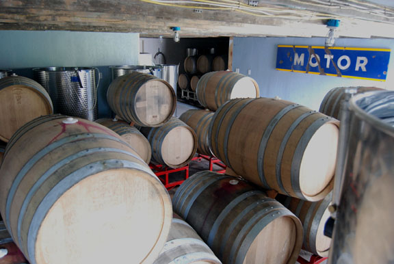 Barrels and tanks stacked to the rafters